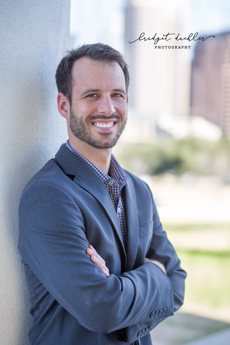 Actor headshot photographed outdoors in soft light in Austin, Texas (vertical frame 26, variation 4)