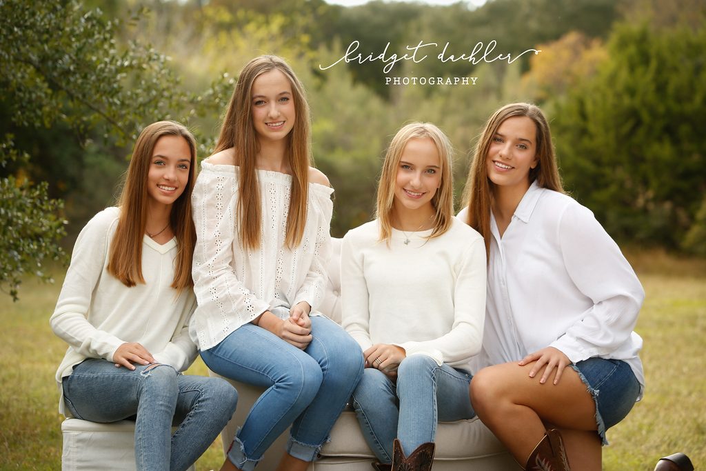 Family laughing together on a natural-light session in the Texas Hill Country (horizontal frame 42, variation 5)