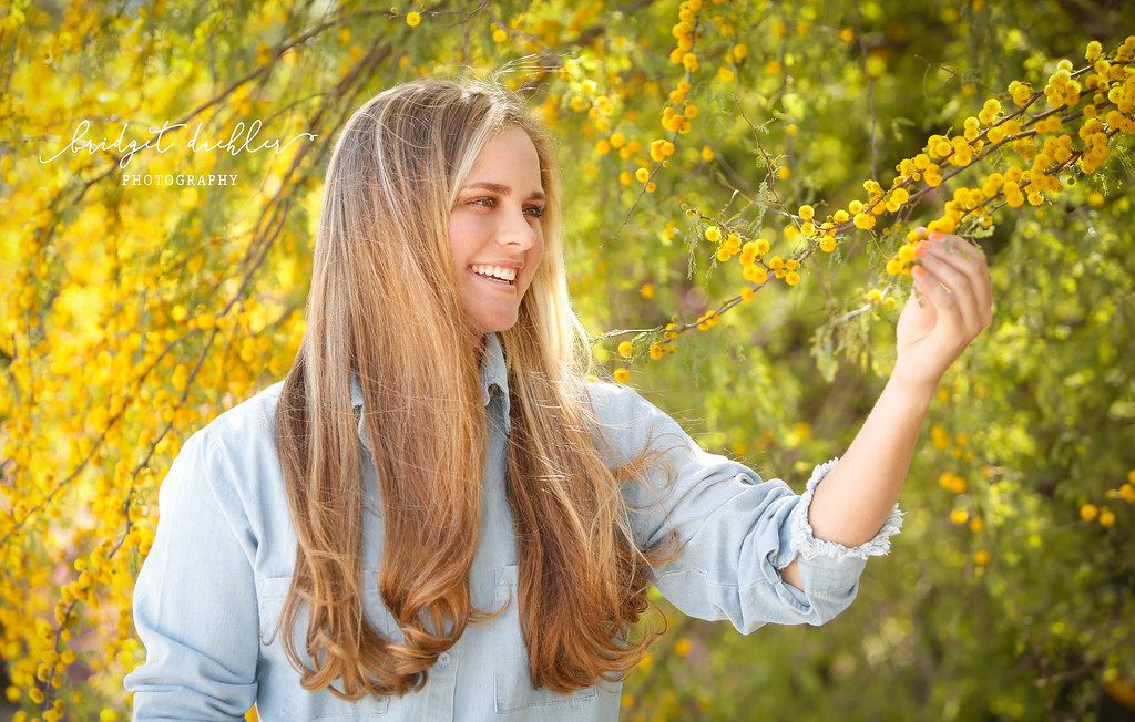 Close-up senior portrait with shallow depth of field, shot outdoors near Austin (horizontal frame 42, variation 4)