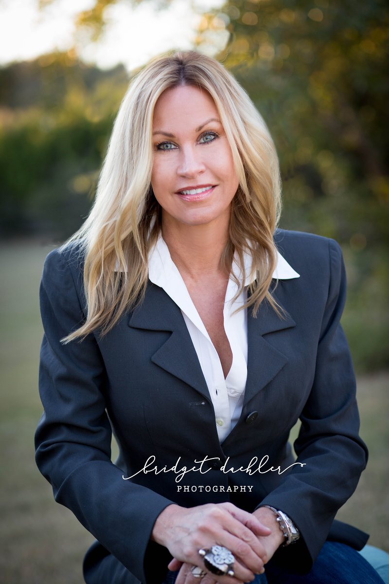 Actor headshot photographed outdoors in soft light in Austin, Texas (vertical frame 10, variation 2)