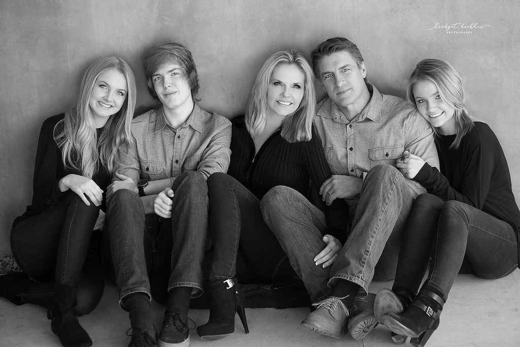 Candid family moment photographed outdoors on location in Austin, Texas (horizontal frame 54, variation 6)