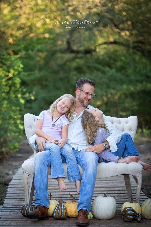 Candid family moment photographed outdoors on location in Austin, Texas (vertical frame 34, variation 4)