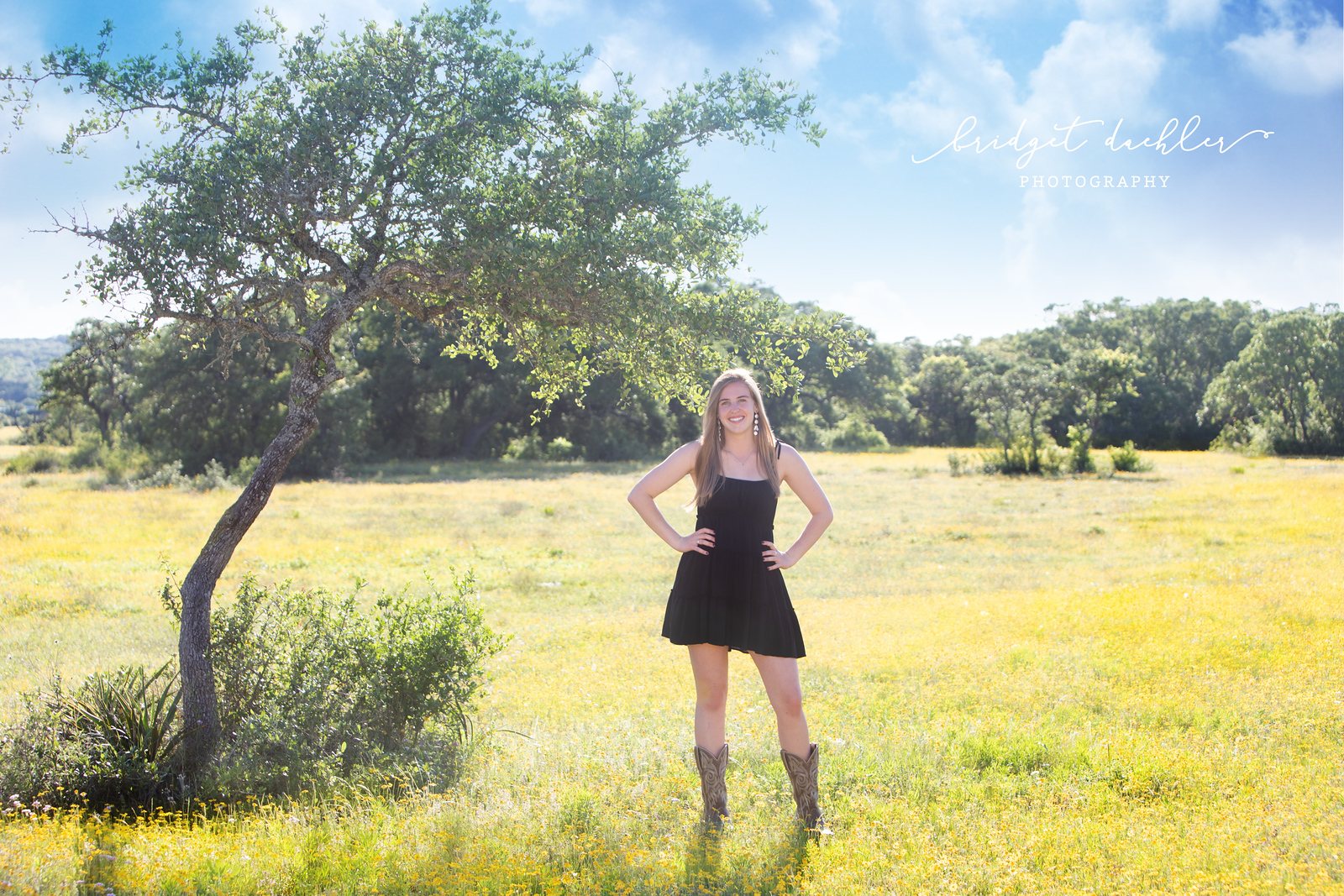 Senior portrait of a graduate posed against warm evening light in Austin, Texas (horizontal frame 14, variation 2)