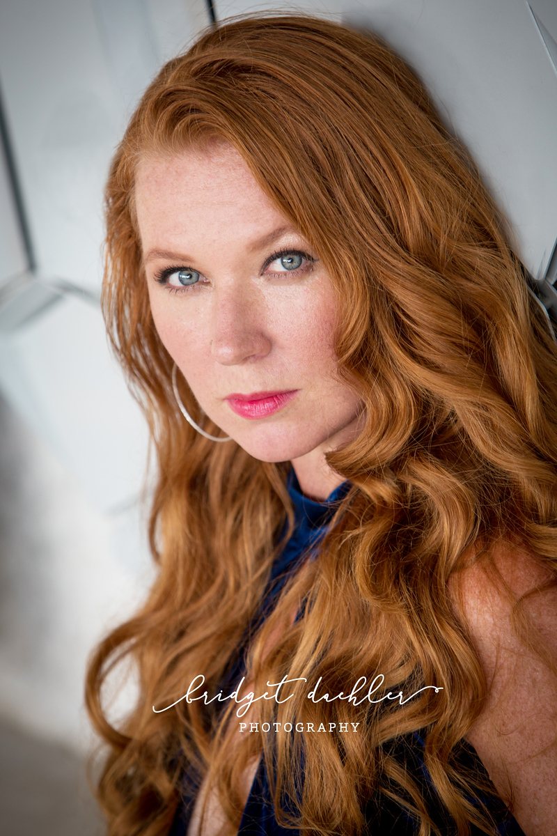 Studio-style headshot with simple backdrop for an Austin professional (vertical frame 21, variation 3)
