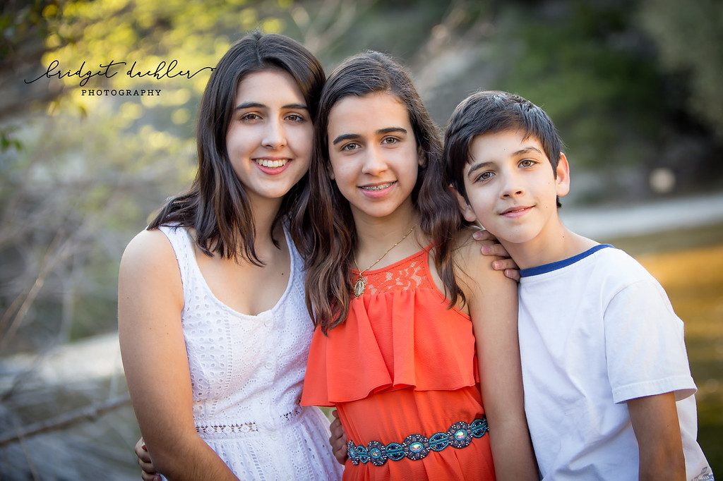Sibling portrait from an outdoor family session in the Austin area (horizontal frame 26, variation 3)