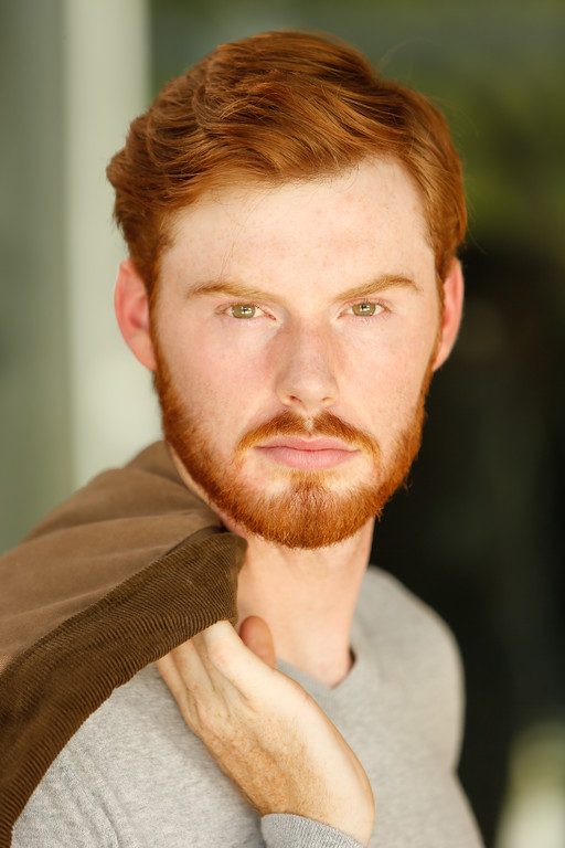 Corporate headshot with a relaxed, natural expression, made in Austin, Texas (vertical frame 35, variation 5)
