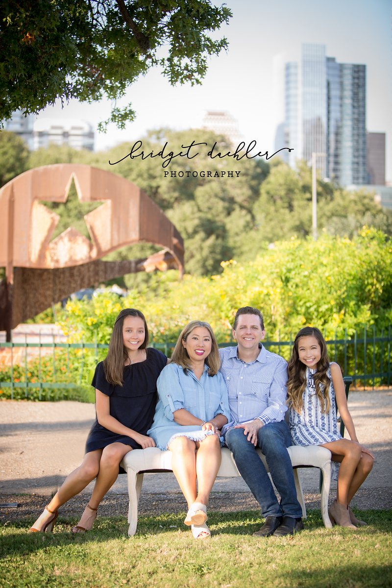 Family walking together during a sunset session in the Texas Hill Country (vertical frame 9)