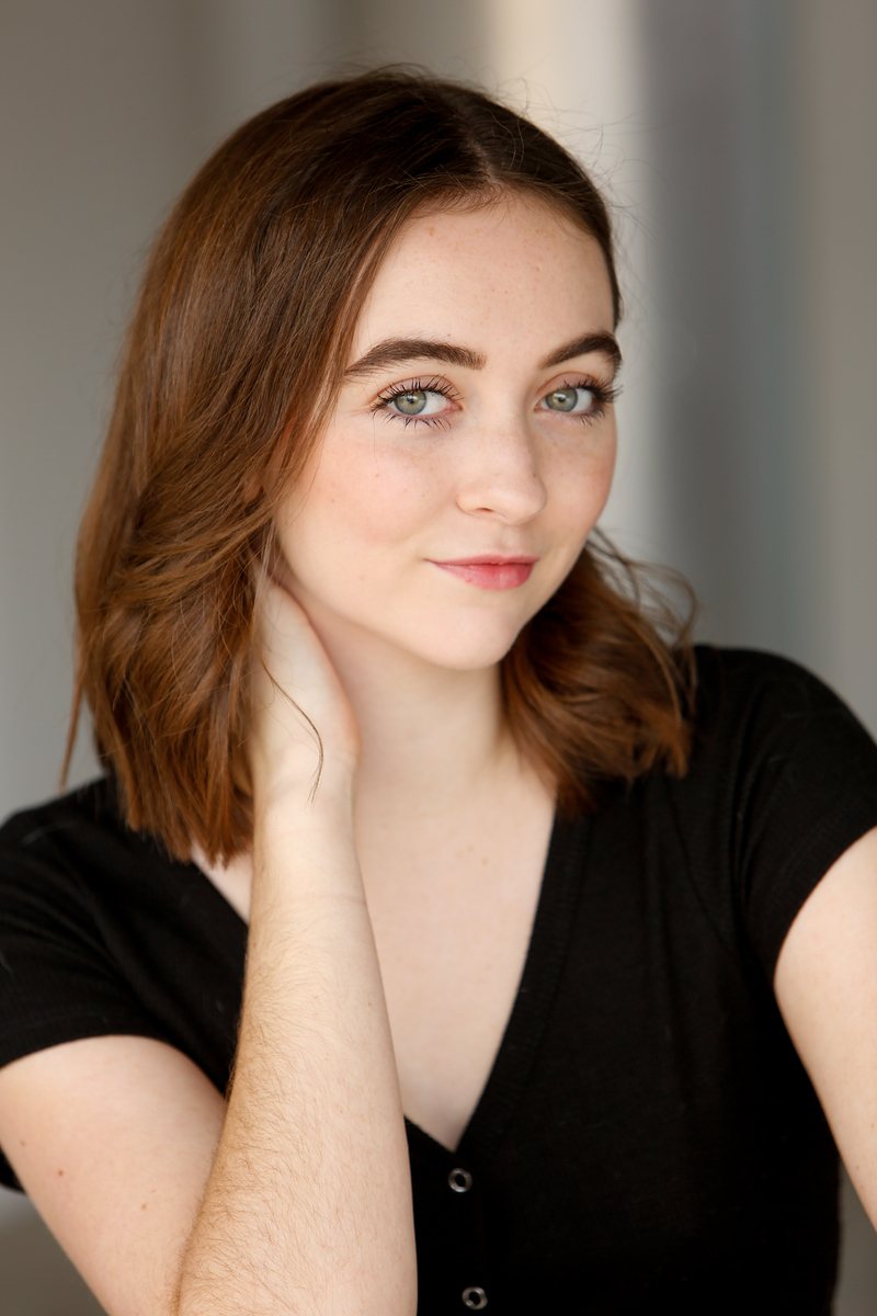 Actor headshot photographed outdoors in soft light in Austin, Texas (vertical frame 34, variation 5)