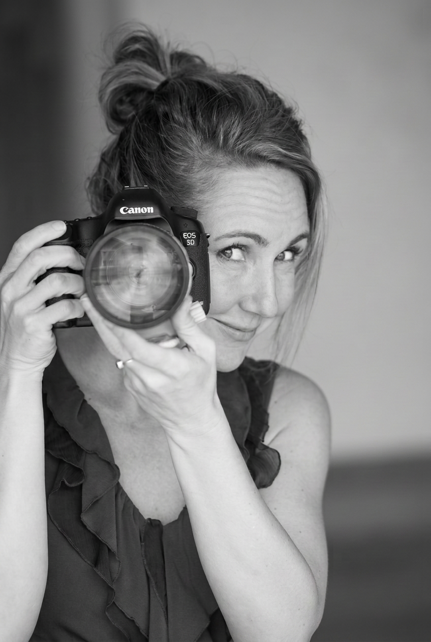 Bridget Daehler holding her Canon 5D on location in Austin, Texas